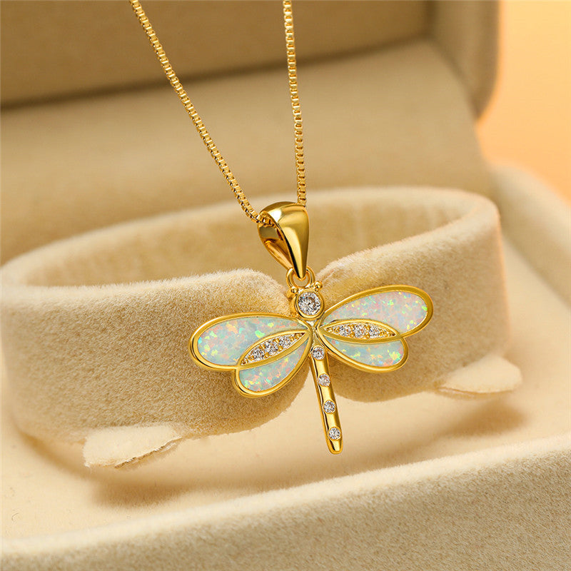 Maggie – Gold dragonfly necklace with opal