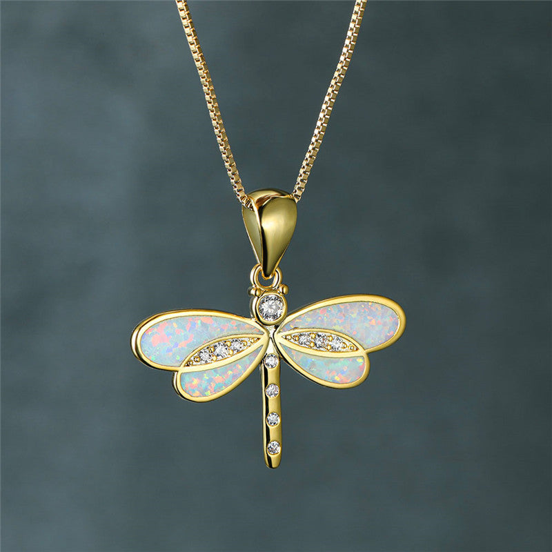 Maggie – Gold dragonfly necklace with opal