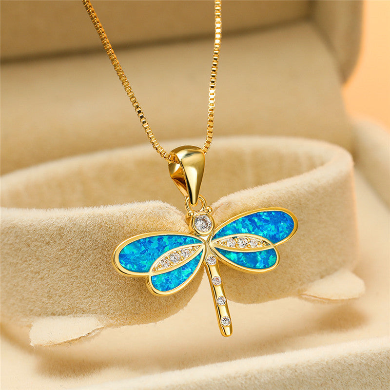 Maggie – Gold dragonfly necklace with opal