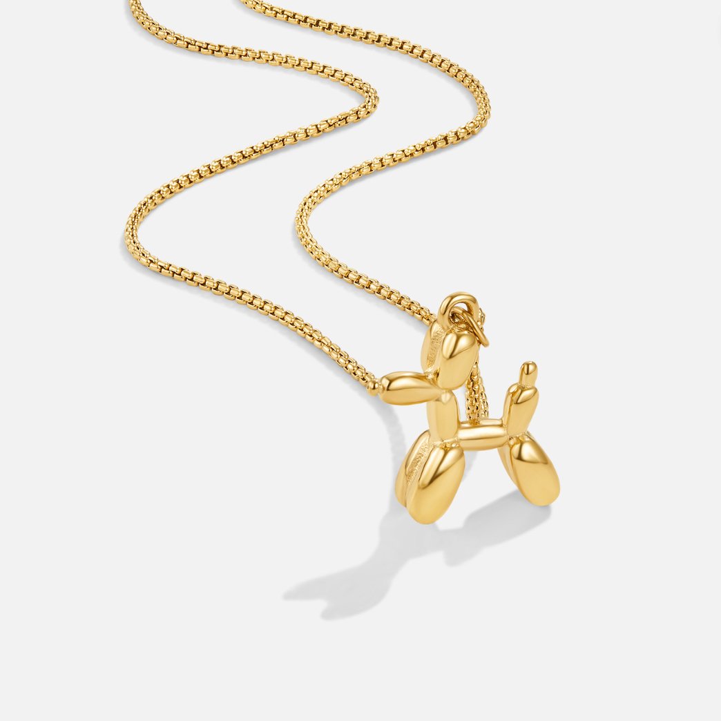 Nerina – Necklace with Dog and Golden Balloon Pendant
